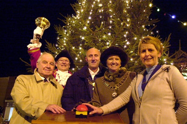 Announcing Garstang's big Christmas lights switch on, town crier Denis Hollowday with town Mayor and a consort, Coun Mrs Norah and Henry Hoyles, Chamber Of Trade chairman, Gail O'Brien and Town Trust chairman Eddie Livesey
