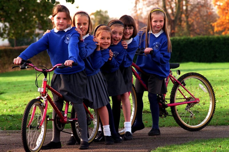 On a bicycle made for six... Hannah Blackburn, Rebecca Gray, Eleanor Jolly, Rachel Rimmer, Cora Fanning, and Gracer Fussell of Our Lady & St Edward Primary School, Fulwood, Preston prepare for their sponsored bike ride