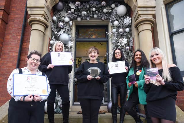 Staff from Urban Flame Spa are celebrating after winning five awards in 2022