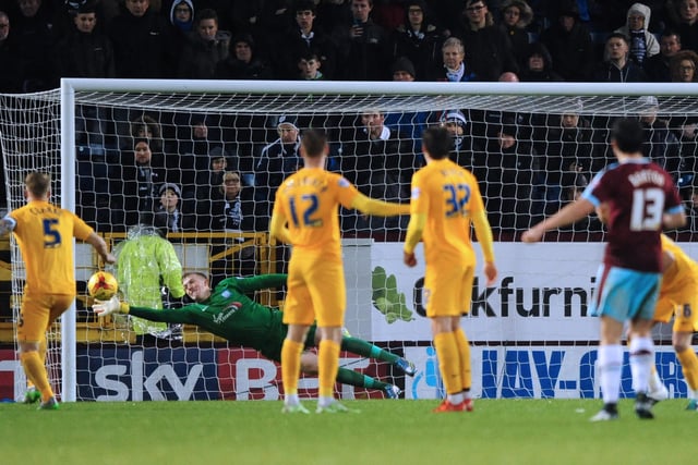 Preston North End's Jordan Pickford dives to his right to keep out a free kick taken by Burnley’s Joey Barton.