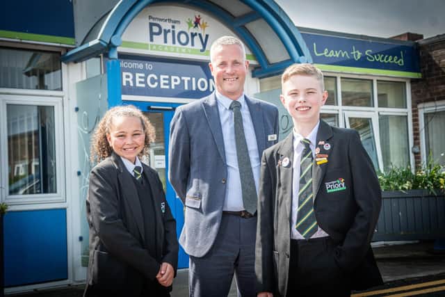 Principal Matt Eastham with pupils at Penwortham Priory Academy