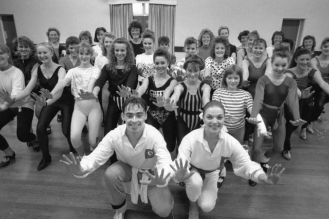 Step to it! Old Boy Richard Cuerden showed members of the Saunders Jones Dance School how it's done. Preston-born Richard, who is currently starring in the musical 42nd Street at Manchester Opera House, was invited back to the school where he learnt his first steps. Richard - and his leading lady Jenna Ward - called in at the St John's Church Hall in Broughton, Preston, and led members of four schools through a few moves