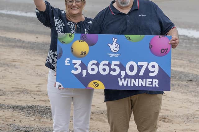 Helen and Lee Kuchczynski, from Cumbria, during a photo call to celebrate their £3.6 million EuroMillions win, in Morecambe, Lancashire. Picture date: Friday July 22, 2022. PA Photo. See PA story LOTTERY EuroMillions. Photo credit should read: Danny Lawson/PA Wire