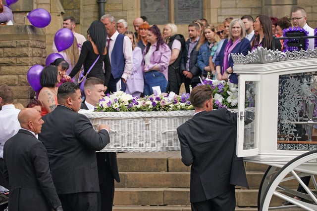 The coffin for Katie Kenyon is carried into St Leonard's Church. (Credit: PA/ Peter Byrne)