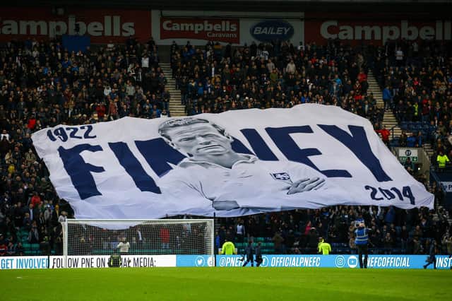 Preston North End fans with a giant Tom Finney banner.