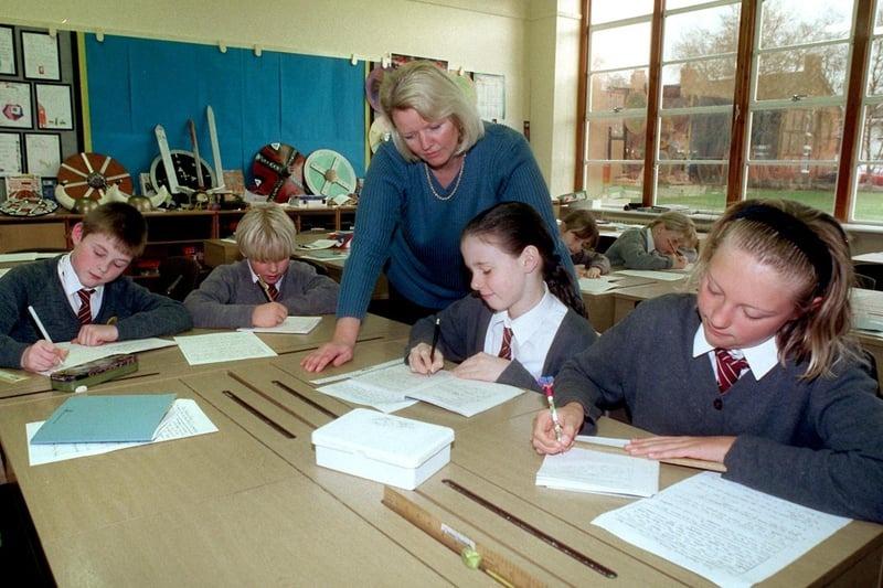 Yvonne Gorton checks over pupils work at Farington County Primary school, Farington, Leyland, where she currently runs the after school club and is hoping to run a homework club