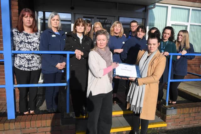 Dr. Ann Robinson (front left) and Dr. Anna Ressel led a delegation of Withnell Health Centre staff protesting at regional NHS offices over plans to transfer their surgery to a new operator