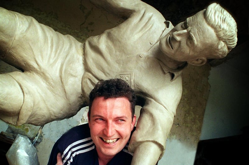 Sculptor Peter Hodgkinson with his finished creation of Sir Tom Finney  at his studio in Broughton, Preston. The clay model will now be moulded in plastic to form a cast for the statuel.