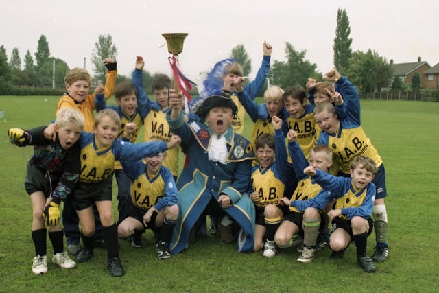 Youngsters from a Leyland football team had plenty to shout about with the arrival of their new kit. Preston town crier and assistant team manager Mike Chapman was on hand to announce the arrival of the strip which will be worn with pride by the Leyland United Reformed Church cubs side