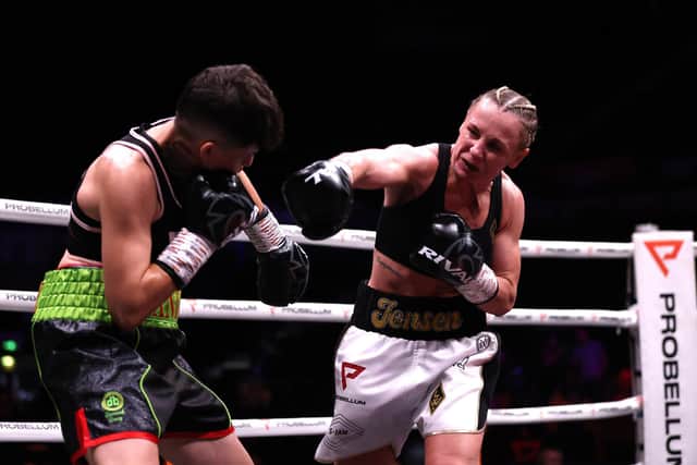 SHEFFIELD, ENGLAND - NOVEMBER 11: Lisa Whiteside and Eva Cantos exchange blows during their Super Bantamweight fight at Sheffield Arena on November 11, 2022 in Sheffield, England. (Photo by George Wood/Getty Images)