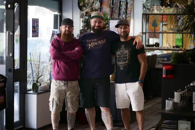 Reilly (receptionist), Shamack (studio owner/biomechanical tattoo artist), Pedro (tattoo artist). Photo: Inkden Tattoo Studio
