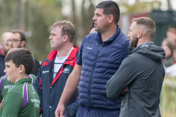 Paul Arnold (centre) takes charge of Hoppers for the final time (photo: Mike Craig)