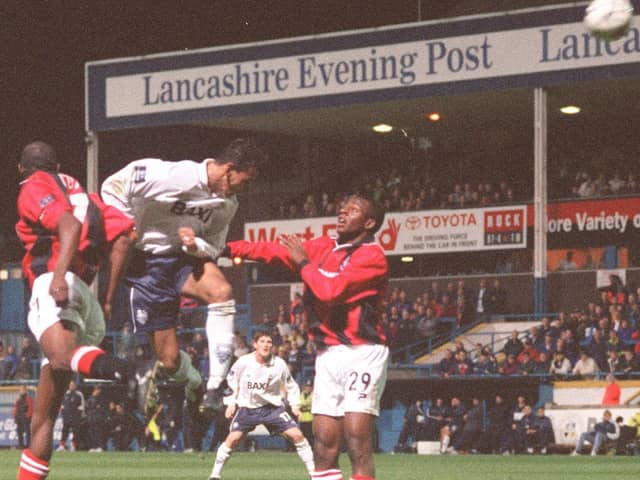 Preston North End striker Kurt Nogan challenges in the air against Bournemouth at Deepdale in November 1999