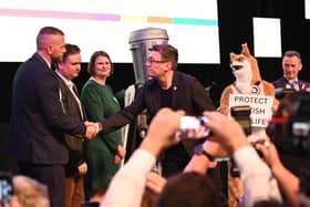 Andy Burnham shakes Rob Kenyon’s hand after results announced