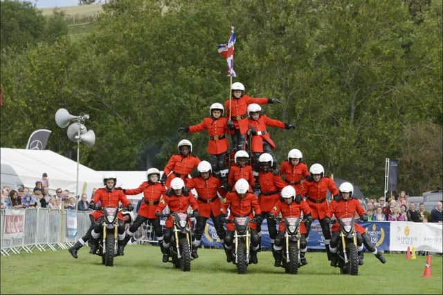 The daredevil IMPS Notorcycle Display Team in action.