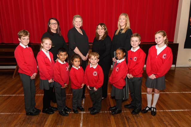 Staff and pupils at St Peter's CofE Primary School