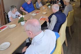 Residents at HC-One’s Summerhill Care Home enjoying a cheese and wine evening