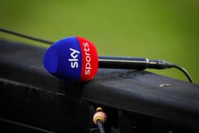 A Sky Sports microphone sits on the advertising boards after the match