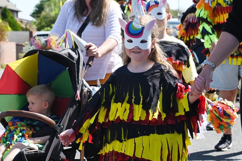 Behold the mask - youngsters enjoyed themselves at Warton Carnival