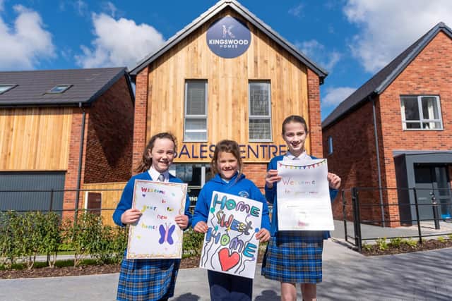 Art competition winners Jessie Brown, Jessica Cowell, Erin Hesketh from Great Eccleston Copp CE Primary School at The Hawthorns, Elswick, where Kingswood is building houses