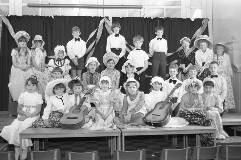 Old-time music hall had a distinctly young flavour at a village school. Youngsters from Adlington County Primary School, near Chorley, turned the clock back with an end of term concert for parents. There was also music for more modern tastes when the children sang songs from shows, including Grease and Oliver