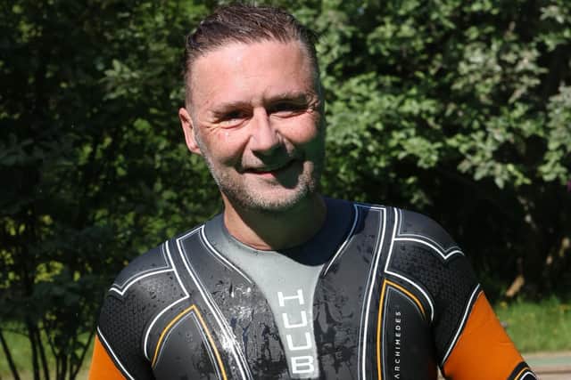 Oli McCann after completing his swim on Lake Windermere. Photo: The Napthens Foundation