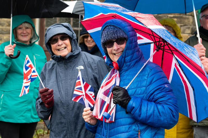 Crowds brave the rain awaiting the arrival of Princess Anne to Trawden. Photo: Kelvin Lister-Stuttard