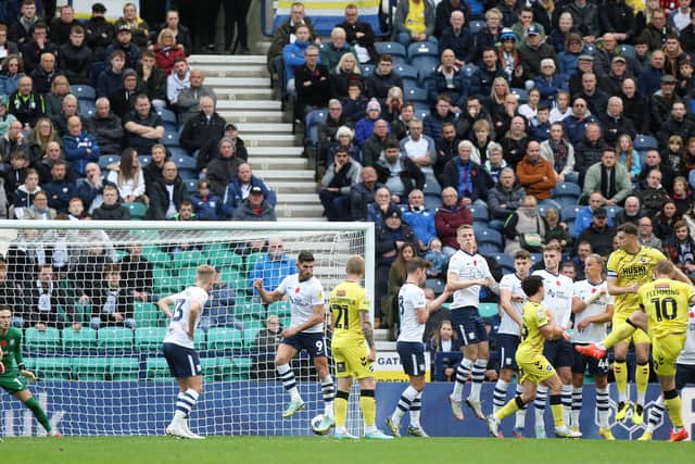 Millwall's Zian Flemming beats the Preston North End wall to scores his side's second goal