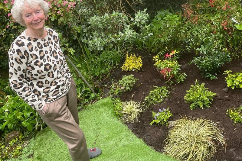 Garden-lover Dorothy admiring the plants donated by Bannister Hall Nursery in Higher Walton