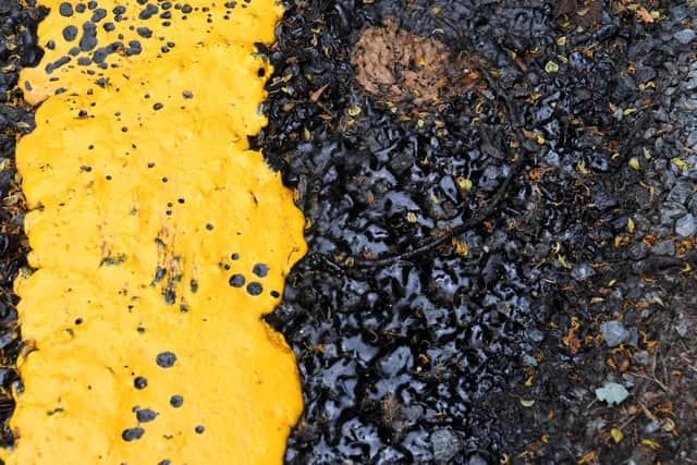 Was the tar still too wet for the road to be reopened?