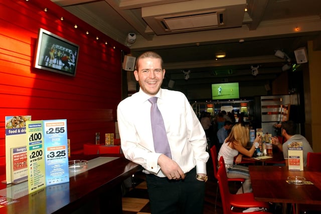 Assistant Manager Jason Collins in Yates's, Church Street, Preston