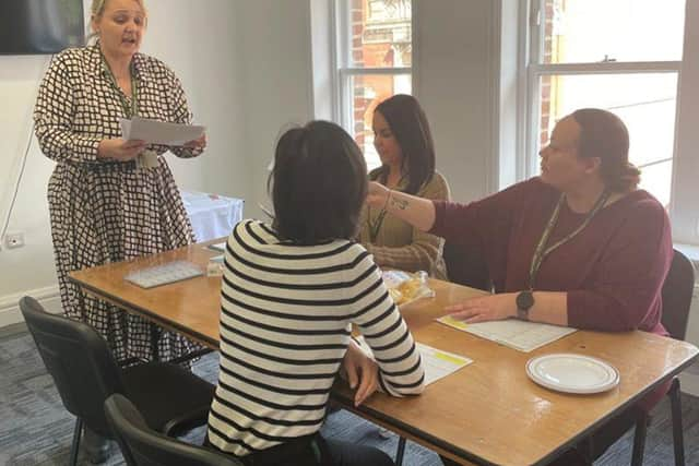 Training and recruitment coordinator Lisa Fisher and homecare assistants in the Academy