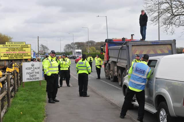 A man refuses to come down from the back of a truck on Preston New Road, Little Plumpton, in an anti-fracking protest in 2017