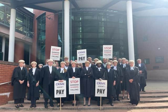 Criminal barristers outside Preston Crown Court yesterday. CBA say their action is aimed at redressing the shortfall in the supply of criminal barristers to help deal with the crisis in our courts.