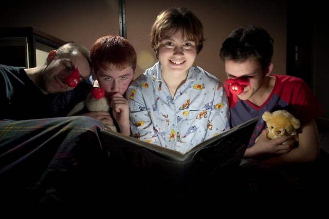 Preston College performing arts students, from left, James Duncan, 22, Gerard Neil, 16, Elanie Diffenthal, 17, and Ben Jarman, 18,  prepare for a sleepover at the college in Fulwood for Red Nose Day in 2003