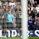 Arsenal's Gabriel is shown a red card by referee Chris Kavanagh during the Premier League match at Elland Road.