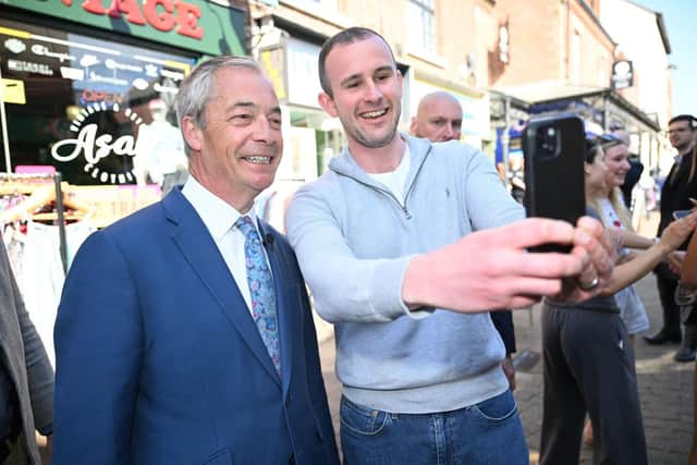 The Reform leader was stopped for several selfies in Ormskirk town centre during his local election visit (image credit: Stuart Mitchell)