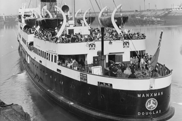 This image taken in 1964 shows The Manxman leaving Heysham Harbour packed with 2,000 trippers taking part in a trip to the Isle of Man