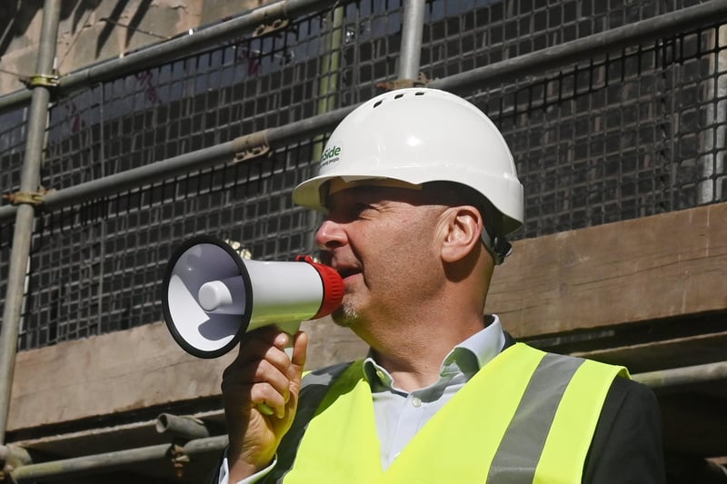 Vault CEO Tim Jacques welcomes visitors for a behind-the-scenes look at progress