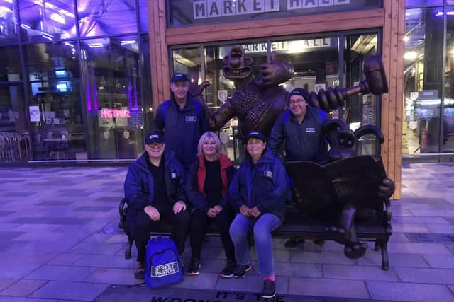 Preston Street Pastors at the Wallace and Gromit statue in Preston Market.  Photo: Paul A Blackett