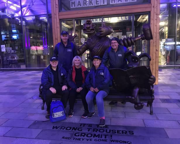 Preston Street Pastors at the Wallace and Gromit statue in Preston Market.  Photo: Paul A Blackett