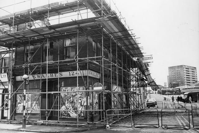 This building, the former Swalbe's ladies outfitters on Church Street, Preston, had lain empty for a long time before demolition work was set to take place for a road widening scheme. But in 1974 rubble was spotted falling from the top storey and building inspectors decided this storey should be removed