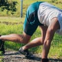 Matt Donnelly on a bear crawl in the Lancashire countryside
