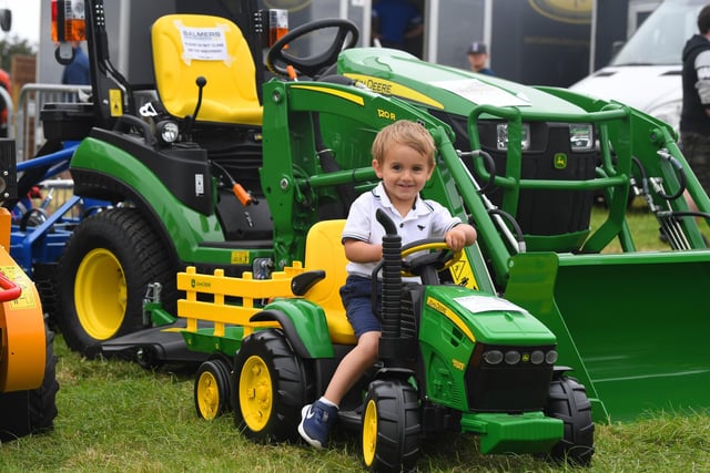 Two-year-old George Clarke on his tractor