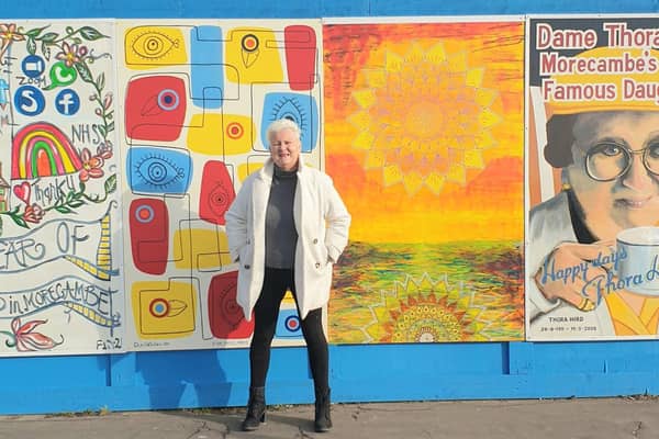 Councillor Margaret Pattison (West End) with the paintings.