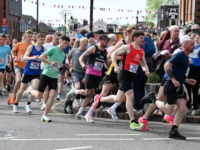 Action from the Chorley 10K, as people lined the street so show support for the runners.