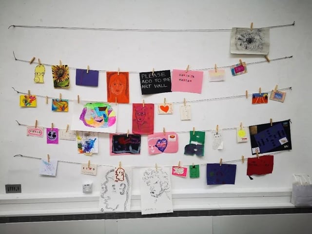Adding art to the community wall