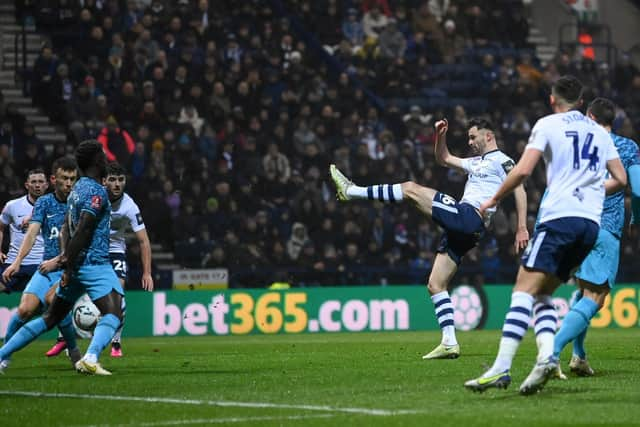 Andrew Hughes of Preston North End shoots during the Emirates FA Cup Fourth Round match between Preston North End and Tottenham Hotspur at Deepdale