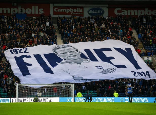 Preston North End fans with a giant Tom Finney banner during their derby win against Blackpool in April.