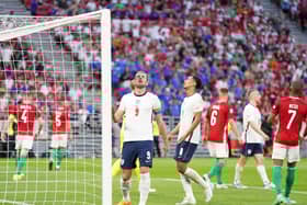 England's Harry Kane and Jude Bellingham show their frustration in the defeat to Hungary